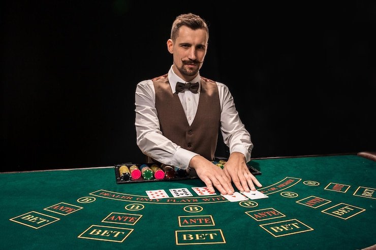 Live dealer at Treasures of Aztec studio on dultogel link, HD video feed showing table layout and card placement